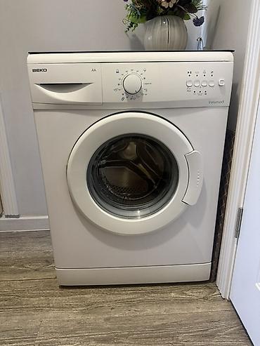авто толщиномер: Стиральная машина BEKO Volumax5 (фронтальная загрузка) - Класс — 4