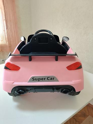 laptop za decu igracka: Dečiji električni auto – rozi “Super Car” (stil Audi RS8) - Pogon na — 2