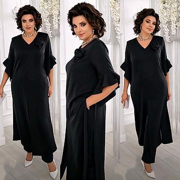 Kompleti: Komplet, haljina+pantalone
Cena 2900
Uni vel.
V23 — 7