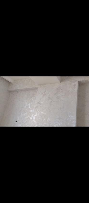 Divar kağızları, oboy: Aboy ustası malyar ustası malyar işləri görürük cəld və gözəl iş — 3