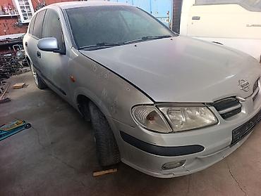 daewoo matiz 2002: Nissan Almera N16 серебристый хэтчбек (5 дверей) Характеристики и — 4