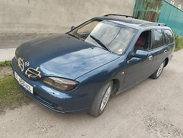 зеркало х5: Nissan Primera: 2000 г., Механика, Универсал — 1