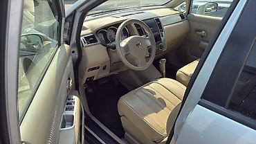 bort baqaj: Nissan Tiida hatchback – gümüşü rəng Xüsusiyyətlər və təchizat: - — 5