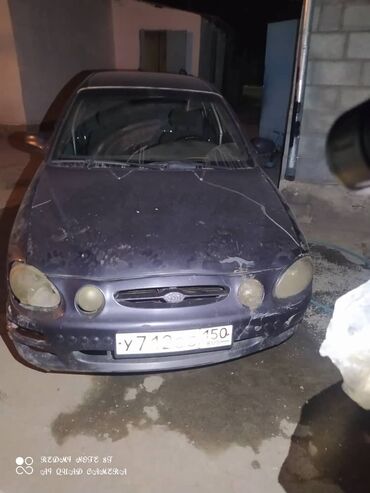 Двигатели, моторы и ГБЦ: Бензиновый мотор Kia 1997 г., 1.8 л, Б/у, Оригинал