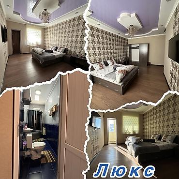 Гостиницы, отели (Посуточная аренда комнат): Посуточная студия/номер с современным ремонтом и полным оснащением. - — 13