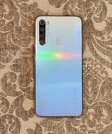tecili satilan telefonlar: Xiaomi 64 GB, rəng - Ağ, 
 Barmaq izi — 1