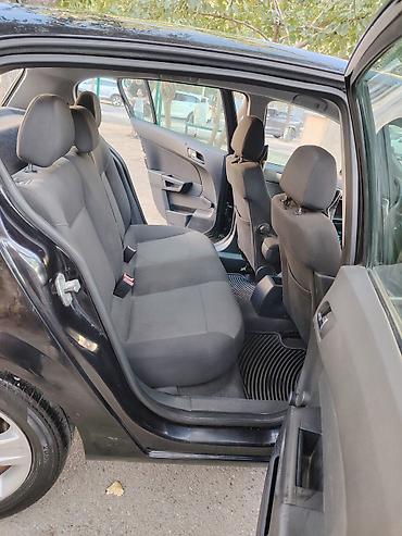 Opel: Opel Astra H, 5 qapılı hetçbek, qara rəng Xarici görünüş: - H kuzov — 9