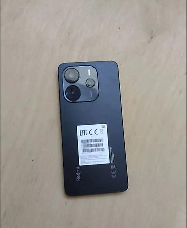 14 pro max kabro: Redmi smartfon Xüsusiyyətlər: - Arxa tərəfdə üçlü kamera modulu və — 1