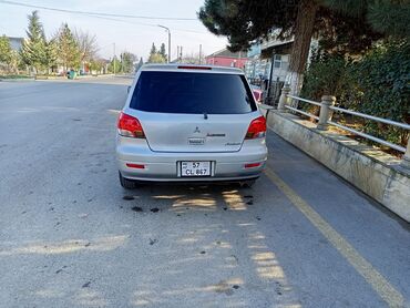 Mitsubishi: Təcili. Mitsubishi Airtrek – gümüş rəngli, şəhər və uzun yol üçün çox — 3