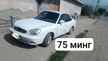 запчасти на опель вектра с: Белый седан Daewoo Nexia с четырьмя дверями, идеально подходящий для