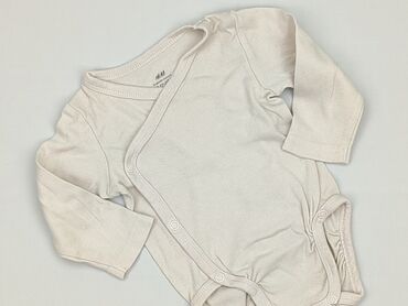 sukienki do ślubu cywilnego dla 60 latki: Body, H&M, 1-3 m, 
stan - Bardzo dobry