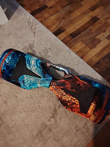 Электротранспорт: Rəngli “alov və buz” dizaynlı hoverboard / giroskuter. Xüsusiyyətlər — 1