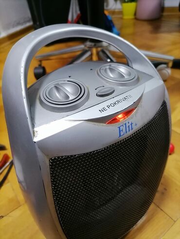 Kaloriferi: Grejalica duvaljka 1500 w ispravna Original vrti levo-desno (profi) — 10