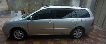 corolla fara: Toyota Corolla: 1.4 l | 2006 il Universal — 2