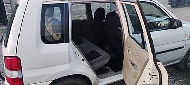 demio sport: Mazda Demio: 1999 г., 1.5 л, Механика, Бензин, Хэтчбэк — 7