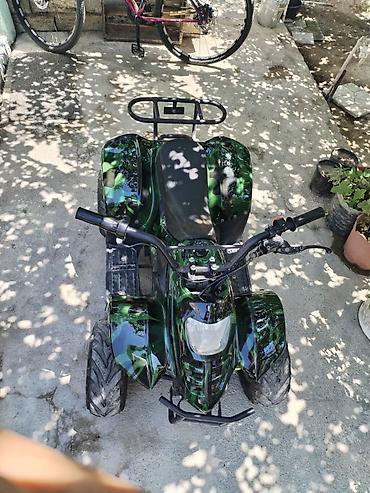 Uşaq dünyası: Uşaq/yeniyetmə üçün elektrikli mini kvadrosikl - Rəng — 1