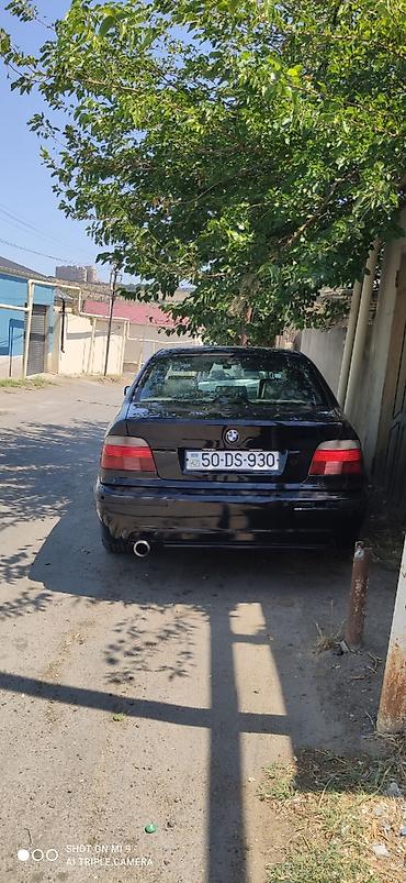 mercedes e class: BMW 5 series: 3 l | 1998 il Sedan — 2