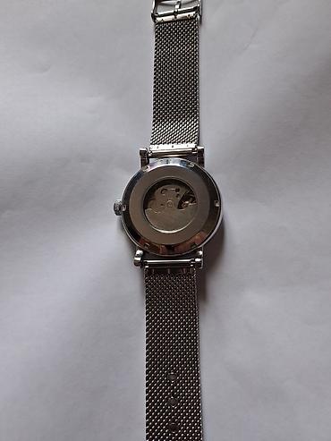 takema saat: Tissot mexaniki qol saatı - Korpus: parlaq metal (gümüşü ton) — 1