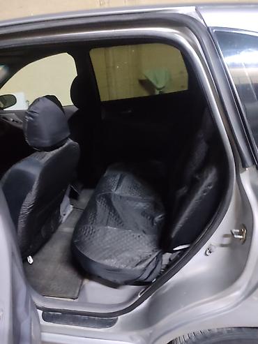 e500 124: Nissan Almera Tino: 2005 г., 1.8 л, Механика, Газ, Универсал — 8