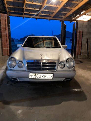 опель фронтера а: Mercedes-Benz E‑Class (W210), седан, серебристый цвет. Салам алейкум