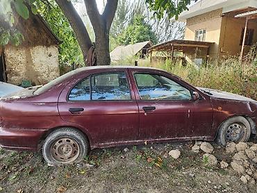 нур мото: Nissan Almera: 1998 г., 1.4 л, Механика, Седан — 4
