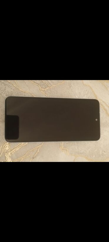 телефон fly nimbus 1: Xiaomi Redmi 12, 128 ГБ, цвет - Голубой, 
 Сенсорный, Отпечаток пальца, Две SIM карты