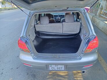 Mitsubishi: Təcili. Mitsubishi Airtrek – gümüş rəngli, şəhər və uzun yol üçün çox — 10