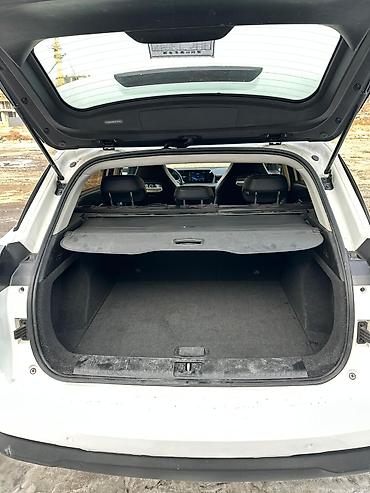 Другие автомобили: Электрокроссовер SWM EDi05 (белый цвет кузова) Кузов и дизайн: - — 11