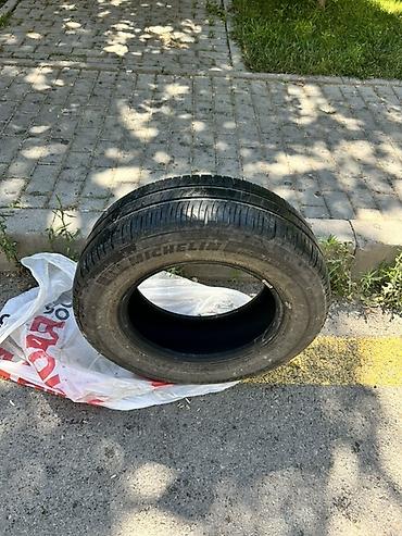 185 65 14 type 0: Michelin markalı avtomobil şini. Ölçüsü: **185/70 R14** Yük/sürət — 4