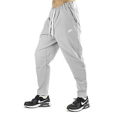 Pantalone: NIKE Club Woven Tapered Leg Pants Standard Fit Grey vel.M,L — 1