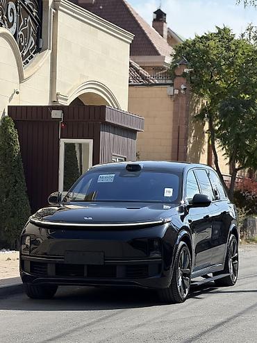 roewe ei5: Lixiang L9: 2023 г., 1.5 л, Электромобиль — 9