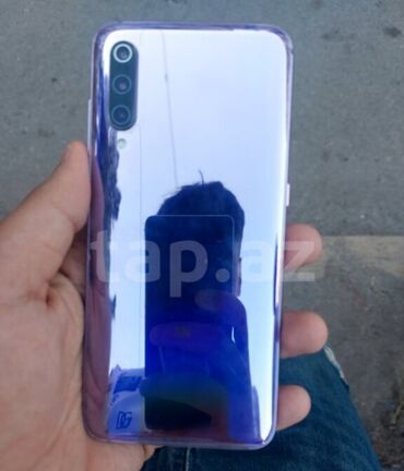 купить айфон 6 с бу: Xiaomi Mi 9, 128 ГБ, цвет - Фиолетовый, 
 Сенсорный