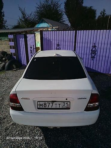 митсубиси цена: Mazda Familia: 2001 г., 1.3 л, Автомат, Бензин, Седан — 4