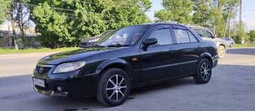 mazda 323 авто: Mazda 323: 2001 г., 1.6 л, Автомат, Бензин, Седан