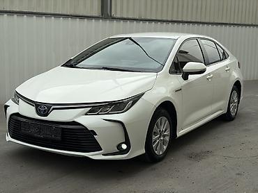 Toyota Corolla: 2019 г., 1.8 л, Вариатор, Гибрид, Седан