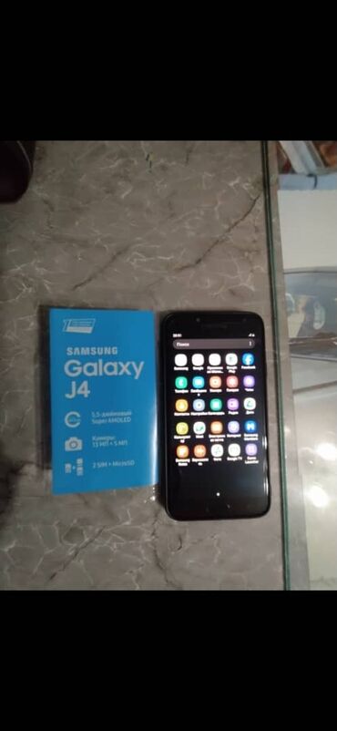 мобильные телефоны самсунг: Samsung Galaxy J4 2018, Колдонулган, 8 ГБ, түсү - Кара, 2 SIM