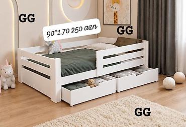 Uşaq çarpayısı – ağ rəng, təhlükəsiz yan qoruyucularla. Alt hissədə