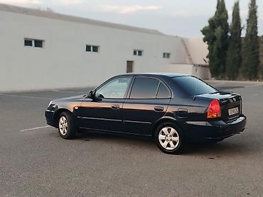 disk masin: Hyundai Accent sedan - Kuzov: 4 qapılı sedan, tünd mavi rəng - — 7