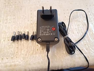 molfix qiymeti: Adapter Almanya istesalıdı 1.5v+12v 7 başlıqla qiyməti 15m — 2