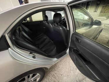 диски на опель зафира а: Седан серебристого цвета, 4 двери, легкосплавные диски. Просторный