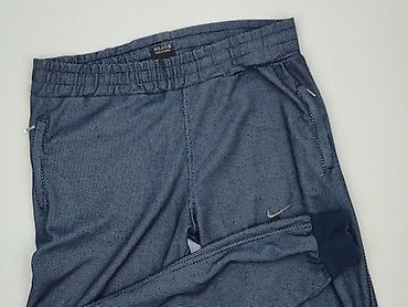 Kobiety: Nike, Spodnie dresowe damskie, rozmiar M — 1