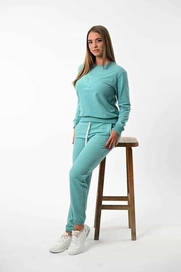 Gornji i donji deo: Ženska dukserica žute boje sa dugim rukavima i okruglim izrezom — 35