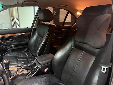 Другие детали салона: BMW — интерьер бизнес-класса с классическим оформлением и богатыми — 6