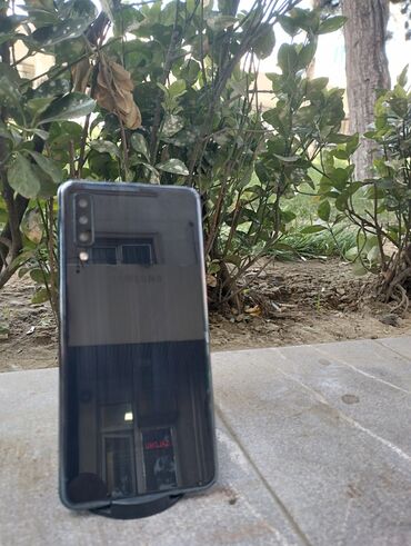 телефон samsung: Samsung Galaxy A7 2018, 64 ГБ, цвет - Черный, Кнопочный, Отпечаток пальца, Face ID