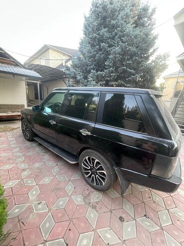 ролс ройс машина: Черный внедорожник Range Rover с темными тонированными стеклами