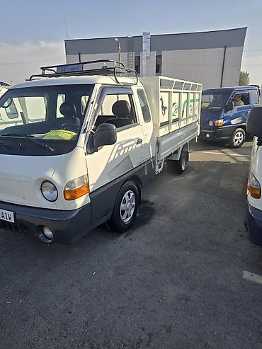пикапы легковые: Hyundai Porter (Porter II) — малотоннажный бортовой грузовик с — 1