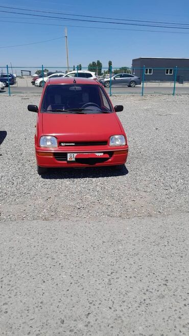 шипованные шины: Daihatsu Cuore: 1991 г., 0.8 л, Механика, Бензин, Хэтчбэк