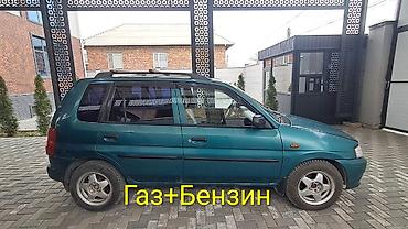 Mazda: Mazda Demio: 2000 г., 1.3 л, Механика, Газ, Хэтчбэк — 1