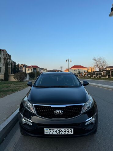 Kia Sportage: 2 л | 2015 г. Кроссовер