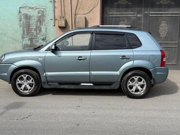 aksesuar maşın: Hyundai Tucson: 2 l | 2009 il Van/Minivan